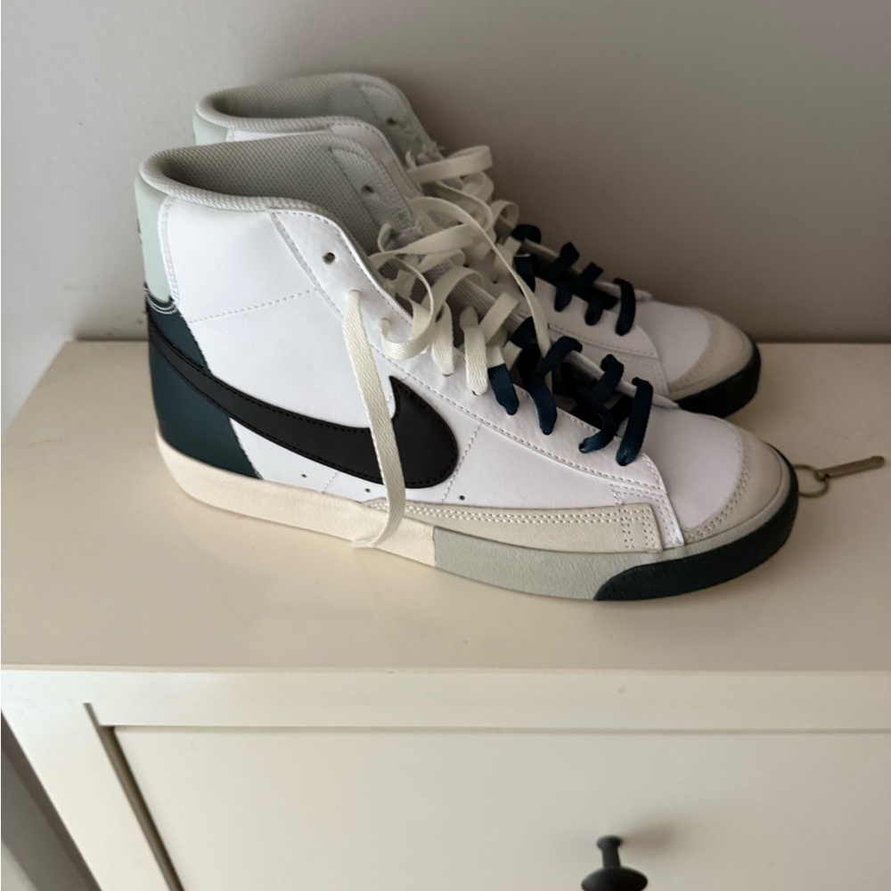 New White and Black Nike High-Top Sneakers